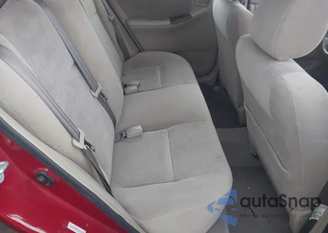 2005 Toyota Corolla Le z USA, uszkodzony, nr VIN JTDBR32E652064743